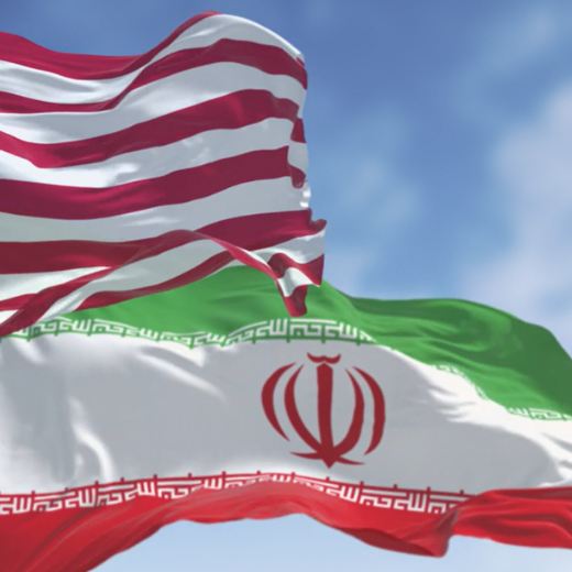 US and Iran flag waving in the wind