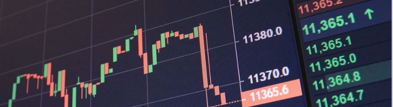Green and red bar charts depicting fluctuating stock market