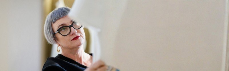 Mature professional woman looking at a document