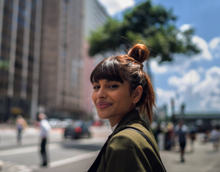 Investing your way image of a smiling person