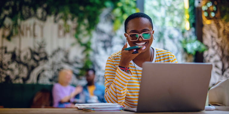 Start investing image of someone talking on the phone