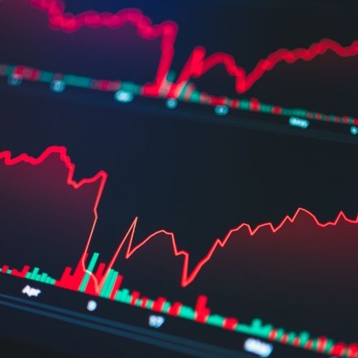 Red and green graph lines on a black background